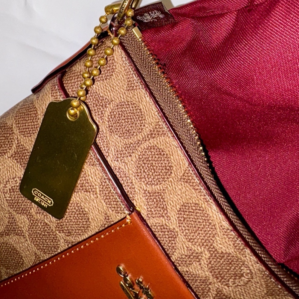 Coach Kitt Messenger
Crossbody In Tan and Rust - Picture 8 of 14
